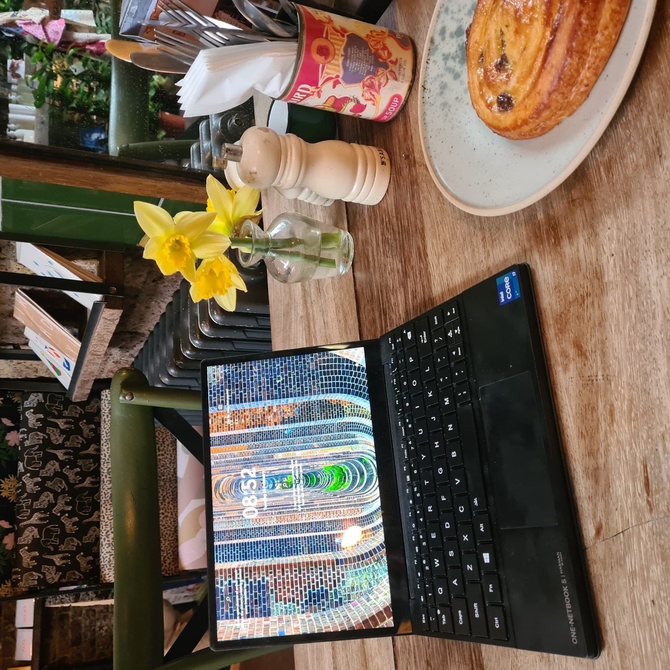 Teeny tiny computer in a in a cafe